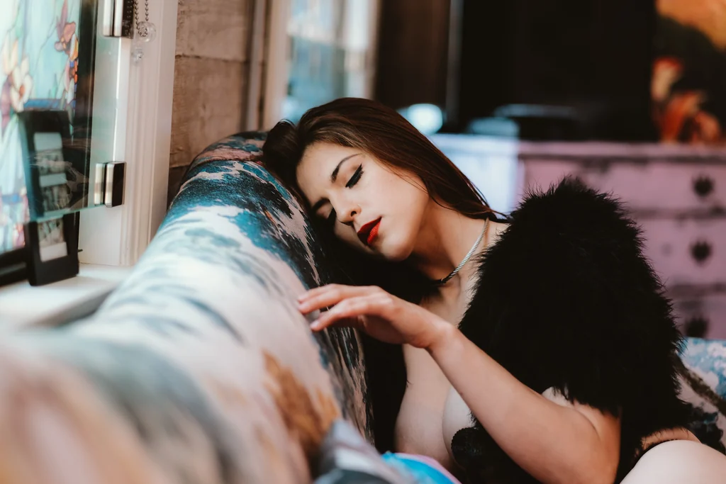 Editorial portrait reclining in fur, a downtown interior