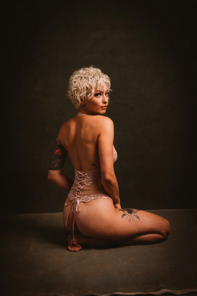 Studio portrait in blush lace
