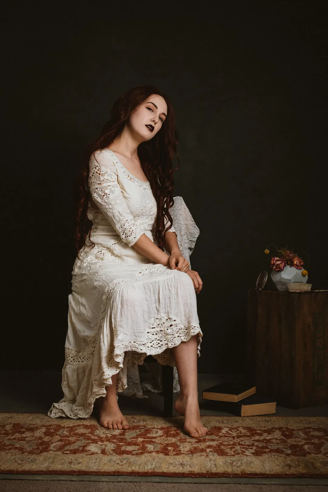 Studio fine art portrait in candlelight — warm painterly tone
